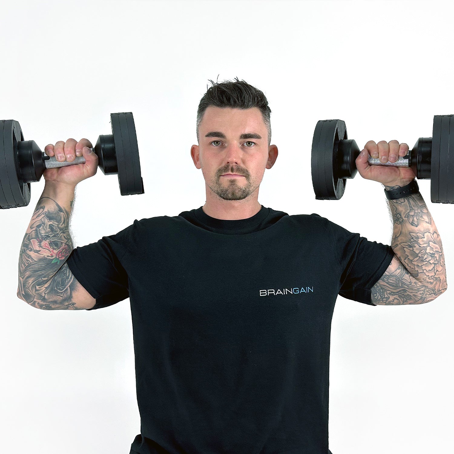 Fitness Model Using BRAINGAIN 45kg Round Adjustable Dumbbells Shoulder Press